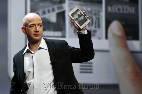 Jeff Bezos, chief executive officer of Amazon.com Inc., introduces the new Kindle Touch e-reader at a news conference in New York.
Bloomberg