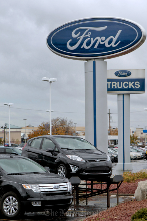 Ford Motor Co. vehicles sit on the lot at the Avis Ford dealership in Southfield, Michigan.   Bloomberg
Ford Motor Co. vehicles sit on the lot at the Avis Ford dealership in Southfield, Michigan.   Bloomberg