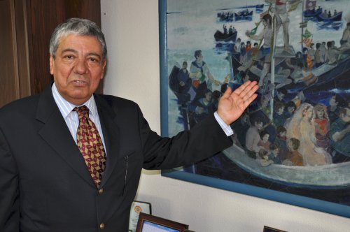 Turkish Ambassador Naci Saribas points to a painting of a traditional Turkish wedding hanging in his
office. (Yoav Cerralbo/The Korea Herald)