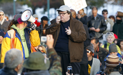 Filmmaker and author Michael Moore addresses Occupy Denver protesters at Civic Center Park in Denver on Nov. 3. (AP-Yonhap News)