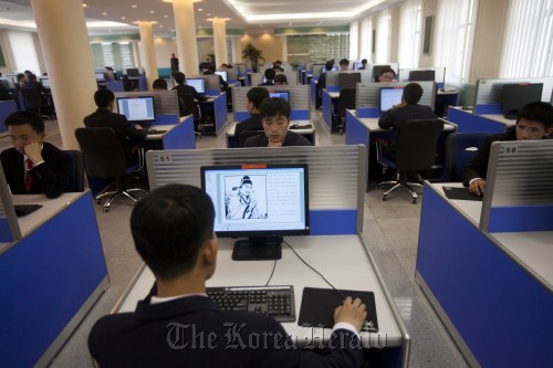 People work on library computers at Kim Il Sung University in Pyongyang, North Korea.   AP-Yonhap News