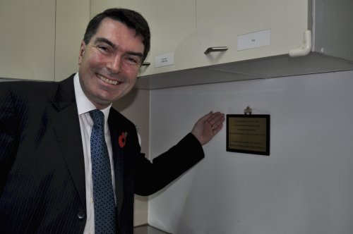 British Ambassador Martin Uden shows the plaque that celebrates his first kiss with his wife. (Yoav Cerralbo/The Korea Herald)