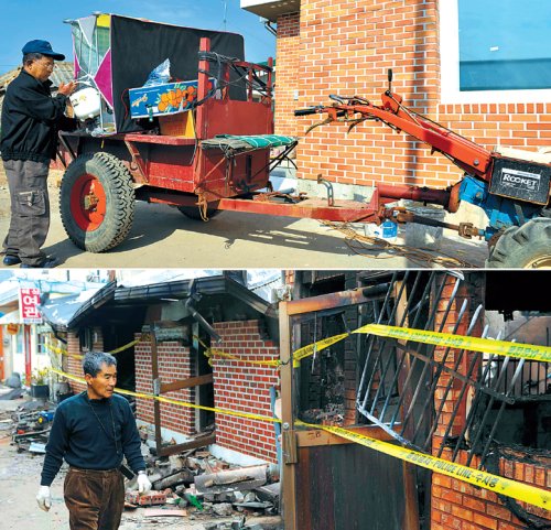 A Yeonpyeong resident moves into his new house (top), rebuilt after bomb damage (bottom). A total of 32 families had their houses destroyed by North Korea’s shelling of the island on Nov. 23 last year. (Kim Myung-sub/The Korea Herald)