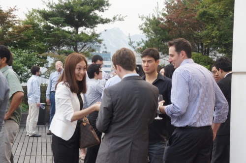 Expats mingle at a Wine Down Wednesday event in Seoul  Linked Seoul