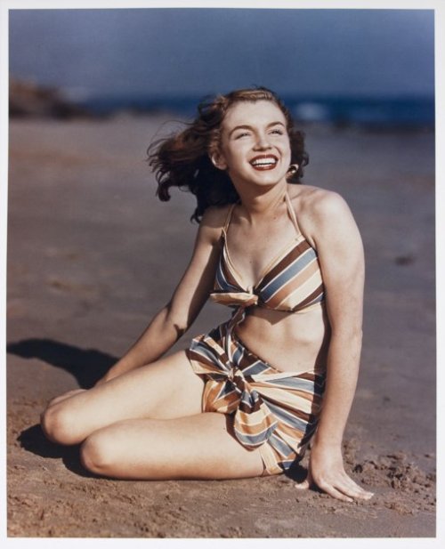 In this 1946 image taken by photographer Joseph Jasgur and released by Julien's Auctions, a photo of Norma Jean Dougherty, who eventually changed her name to Marilyn Monroe, is shown. (AP Photo/Julien's Auctions)