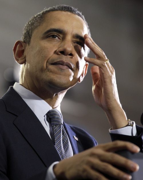 President Barack Obama pauses as he speaks about the economy on Dec.6 at Osawatomie High School in Osawatomie, Kan. (AP)