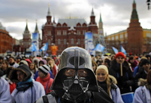 A member of the pro-Kremlin youth movement Stal (Steel) wearing a Darth Vader mask participates in a rally in downtown Moscow, Tuesday, Dec. 6, 2011. (AP)