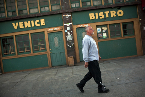 Mystery writer Michael Connely, who calls Tampa Bay, Florida, home, walks along the strand in Venice Beach, California, on April 13, 2010, while doing research for his upcoming book featuring his character Harry Bosch who is an L.A. police officer. (MCT)