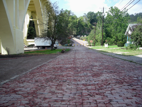 The one-room Great Western Schoolhouse dates to 1870. Owned by Ohio University, it sits next to the old National Road. (MCT)
Pasco Drive in the hamlet of Blaine includes highway bricks from 1917-1918 on the historic National Road in Ohio’s Belmont County. (MCT)
