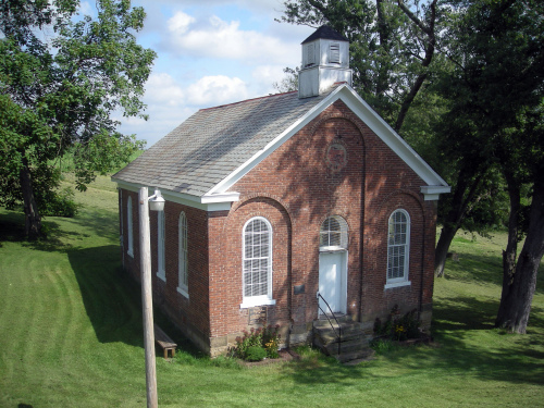 The one-room Great Western Schoolhouse dates to 1870. Owned by Ohio University, it sits next to the old National Road. (MCT)
Pasco Drive in the hamlet of Blaine includes highway bricks from 1917-1918 on the historic National Road in Ohio’s Belmont County. (MCT)