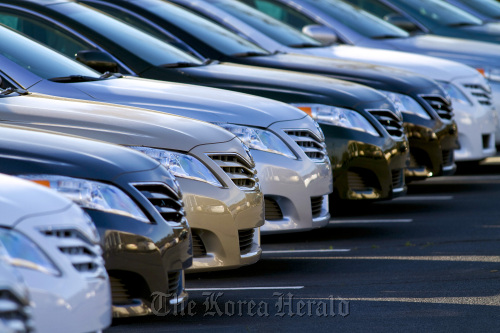 2011 Toyota Motor Corp. Camry sedans sit on display at the Fred Anderson Toyota dealership in Raleigh, North Carolina.  Bloomberg