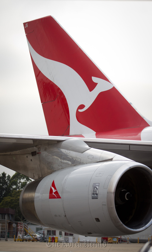 The Qantas Airways Ltd. Boeing Co. 747 aircraft stands in Sydney.  Bloomberg