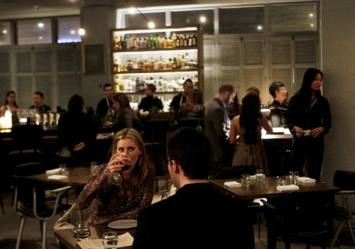 Diners enjoy dinner at Ink, a new restaurant in Los Angeles, California. (Los Angeles Times/MCT)