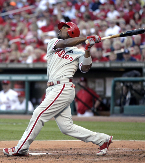 <YONHAP PHOTO-0218> FILE - In this Oct. 4, 2011, file photo, Philadelphia Phillies' Jimmy Rollins bats during the sixth inning of Game 3 of baseball's National League division series against the St. Louis Cardinals in St. Louis. Two people familiar with the negotiations tell The Associated Press on Saturday, Dec. 17, that Rollins has agreed to a 3-year, $33 million contract with the Phillies. The deal includes a vesting option for a fourth year. The people spoke on condition of anonymity because the agreement is not official. (AP Photo/Charlie Riedel, File)/2011-12-18 07:35:06/ <저작권자 ⓒ 1980-2011 ㈜연합뉴스. 무단 전재 재배포 금지.>
Phillies shortstop Jimmy Rollins     AP-Yonhap News