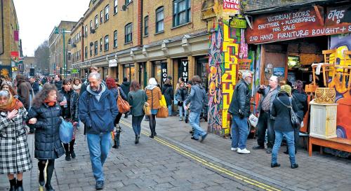 Brick Lane, once an industrial artery, later a stronghold of
Bangladeshi immigrants and now a favored haunt of bohemians and creative types, fills with shoppers and browsers on Sundays.
(Los Angeles Times/MCT)