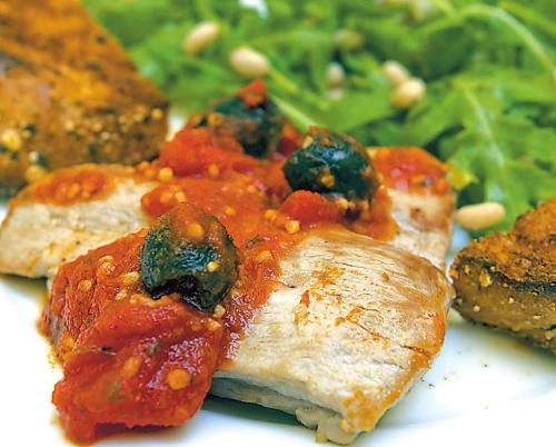 Neapolitan pizza-style sauce over tender, juicy pork (Miami Herald / MCT)