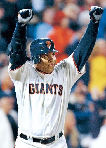 Barry Bonds holds the home run records with 73 in a season and 762 in his career. (File photo)