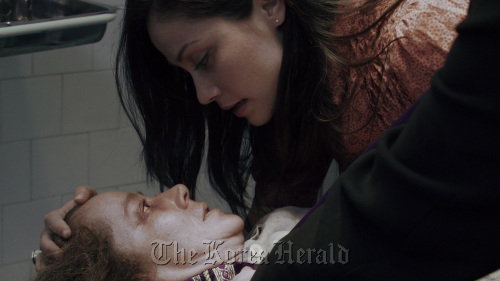 Suzan Crowley (left) as Maria and Fernanda Andrade as Isabella Rossi in “The Devil Inside,” from Insurge Pictures.   MCT