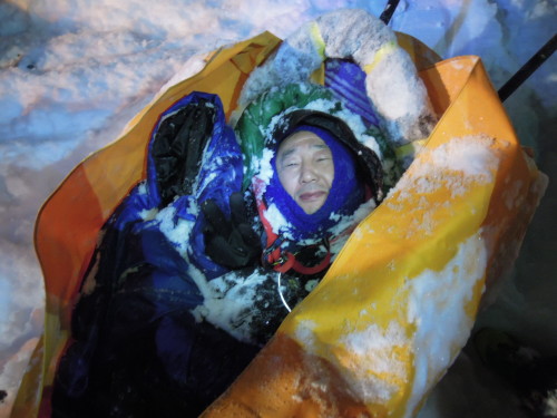 In this Monday, Jan. 16 photo provided by Yong Chun Kim, of Tacoma, Wash., Kim flashes a victory sign after he was rescued after being lost for two days in a blizzard in Mount Rainier National Park, Wash. Kim, 66, was rescued Monday after becoming separated from the snowshoe group he was leading on Saturday. (AP-Yonhap News)