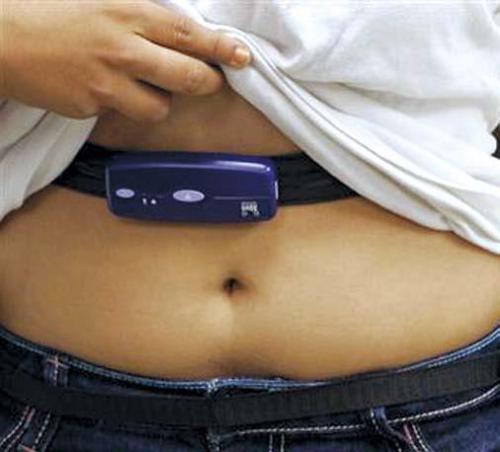 In this file photo, a 15-year-old has her sensor checked before
starting a series of physical activities at a University
of Southern California lab in Alhambra, California. (AP)