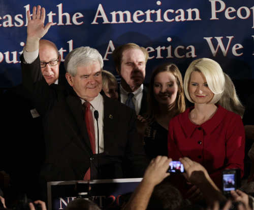 Republican presidential candidate and former House Speaker Newt Gingrich arrives with his wife Callista during a?South Carolina Republican presidential primary night rally, Saturday, Jan. 21, 2012, in Columbia, S.C. (AP-Yonhap News)