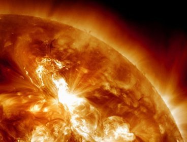 This handout image provided by NASA, taken Sunday night, Jan. 22, 2012, shows a solar flare erupting on the Sun's northeastern hemisphere. (AP via NASA)