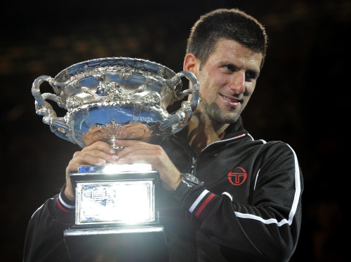 <YONHAP PHOTO-0416> Novak Djokovic of Serbia holds the trophy during the awarding ceremony after defeating Rafael Nadal of Spain in the men's singles final at the Australian Open tennis championship, in Melbourne, Australia, early Monday, Jan. 30, 2012. (AP Photo/Andrew Brownbill)/2012-01-30 06:15:22/ <저작권자 ⓒ 1980-2012 ㈜연합뉴스. 무단 전재 재배포 금지.>
Novak Djokovic of Serbia poses with the Australian Open trophy.  AP-Yonhap News