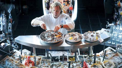 Chef Parke Ulrich works on an oyster platter at his Waterbar restaurant on Jan. 11, in San Francisco, California. (Contra Costa Times/MCT)