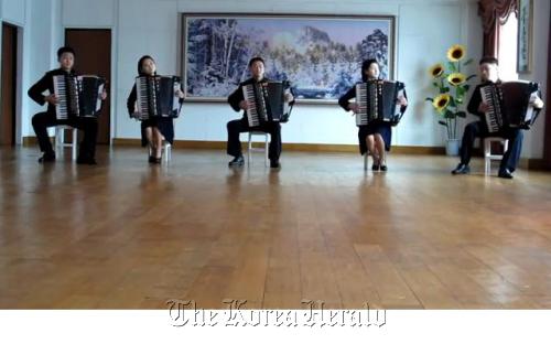 A YouTube capture shows five North Korean students playing 1980s hit “Take on Me” with their accordions. YouTube capture