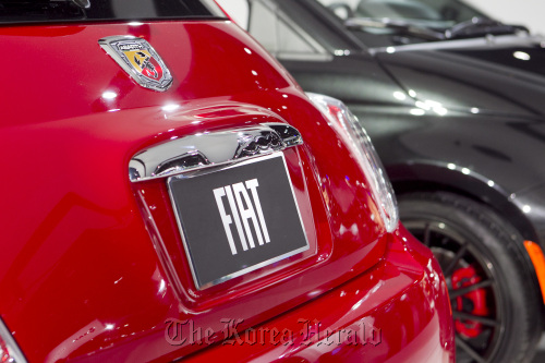 Fiat SpA 500 Abarth vehicle sits on display during the 2012 North American International Auto Show in Detroit.
Bloomberg
Fiat SpA 500 Abarth vehicle sits on display during the 2012 North American International Auto Show in Detroit.
Bloomberg