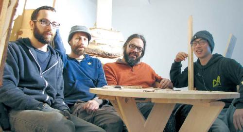 Gregory Chapuisat (second right) takes a break from construction with his team atop his new installation at Seoul’s SongEun ArtSpace. (Kirsty Taylor/The Korea Herald)