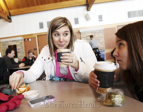 Jen Emmett, having hot chocolate with niece, Kenzie Wolff (right) in Maple Grove, Minnesota, finds the acronym PANK (Professional Aunt, No Kids) applies to her.
Minneapolis Star Tribune/MCT
