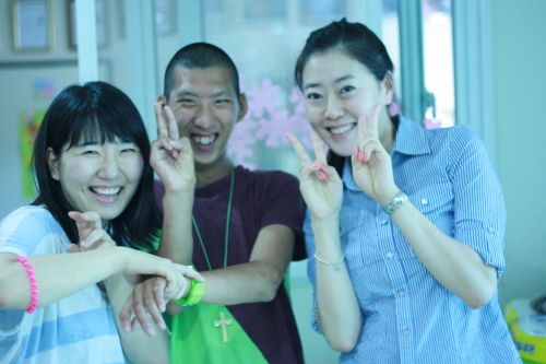 SP Brief: Angel House picture
Two female volunteers laugh with an Angel House resident on a previous visit.   Kirsty Taylor/The Korea Herald