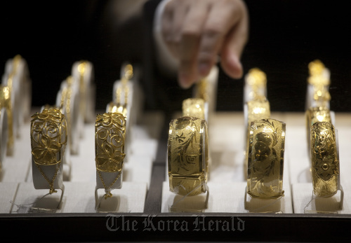 Gold bracelets are displayed at a Chow Tai Fook Jewelery Group Ltd. store in Hong Kong.  Bloomberg
