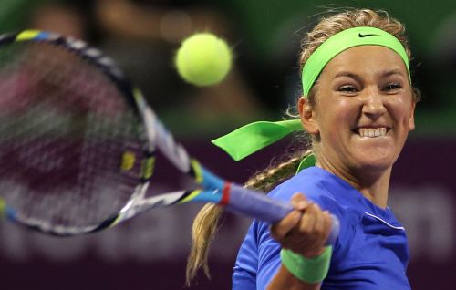 <YONHAP PHOTO-0086> Victoria Azarenka of Belarus returns the ball to Romania's Simona Halep during their WTA Qatar Open tennis match in Doha on February 16, 2012. AFP PHOTO/KARIM JAAFAR../2012-02-17 01:07:45/ <저작권자 ⓒ 1980-2012 ㈜연합뉴스. 무단 전재 재배포 금지.>
Victoria Azarenka returns the ball to Simona Halep during WTA Qatar Open in Doha on Thursday.  AFP-Yonhap News