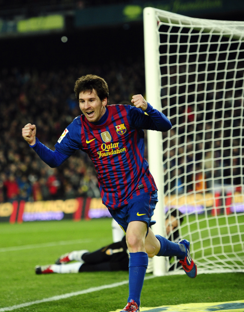 <YONHAP PHOTO-0184> FC Barcelona's Lionel Messi, from Argentina, reacts after scoring against Valencia during a Spanish La Liga soccer match at the Camp Nou stadium in Barcelona, Spain, Sunday, Feb. 19, 2012. (AP Photo/Manu Fernandez)/2012-02-20 06:24:54/ <저작권자 ⓒ 1980-2012 ㈜연합뉴스. 무단 전재 재배포 금지.>
Barcelona’s Lionel Messi celebrates his goal against Valencia.  AP-Yonhap News