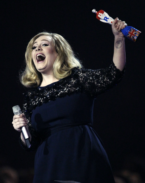 <YONHAP PHOTO-0537> Adele celebrates with the award for the best British Album of the Year during the Brit Awards 2012 at the O2 Arena in London, Tuesday, Feb. 21, 2012. (AP Photo/Joel Ryan)/2012-02-22 07:10:39/ <저작권자 ⓒ 1980-2012 ㈜연합뉴스. 무단 전재 재배포 금지.>
Adele celebrates with the award for best British Album of the Year during the Brit Awards 2012 at the O2 Arena in London, Feb. 21.  AP-Yonhap News