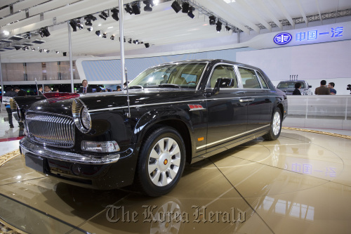 A China FAW Group Corp. Red Flag limousine is displayed at the Beijing Auto Show.  Bloomberg