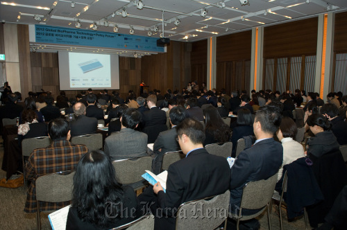 Participants attend the Global Biopharma Technology and Policy Forum in Seoul on Wednesday. Merck Korea