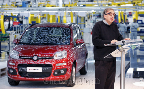 Sergio Marchionne, CEO of Fiat SpA, speaks beside a Panda automobile during a news conference at the company’s factory in Pomigliano, Naples, Italy.  Bloomberg