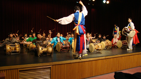A previous class plays the janggu at the National Folk Museum in Seoul. National Folk Museum of Korea