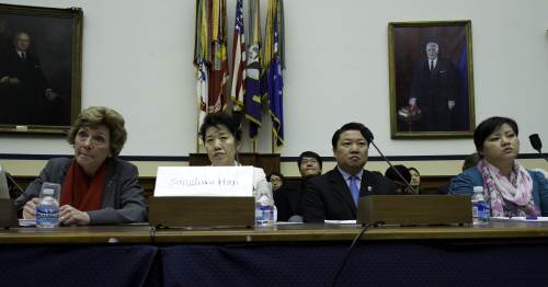 <YONHAP PHOTO-0398> Songhwa Han(2L), former North Korean refugee detained in China, repatriated to North Korea, and detained in North Korea and Jinhye Jo(R), Former North Korean refugee detained in China, repatriated to North Korea, and detained in North Korea testify March 5, 2012 before the US House Foreign Affairs Committee Congressional Executive Commission on China on Capitol Hill In Washington, DC. The committee held hearings on "China's Repatriation of North Korean Refugees." Looking on are: Suzanne Scholte, President, Defense Forum Foundation; Chairman and Founding Member of the North Korea Freedom Coalition and an unidentified interpreter. AFP PHOTO/Karen BLEIER../2012-03-06 09:19:20/ <저작권자 ⓒ 1980-2012 ㈜연합뉴스. 무단 전재 재배포 금지.>
Han Song-hwa (second form left) and Jo Jin-hye (right), former North Korean refugees detained in China and repatriated, testify before the U.S. House Foreign Affairs Committee Congressional Executive Commission on China on Capitol Hill in Washington, D.C., Monday.
AFP-Yonhap News