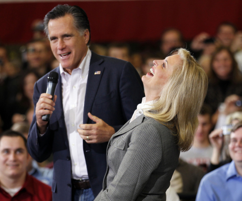 Ann Romney, wife of Republican presidential candidate, former Massachusetts Gov. Mitt Romney, laughs with him as he speaks at a town hall meeting at Taylor Winfield in Youngstown, Ohio, Monday. (AP-Yonhap News)