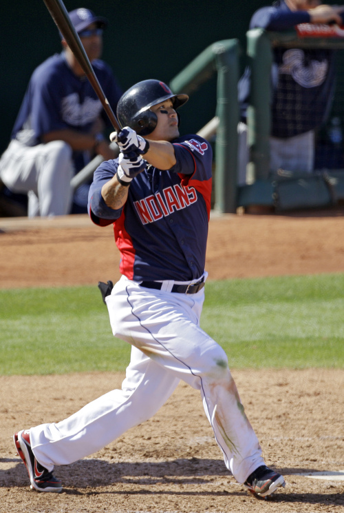 <YONHAP PHOTO-0226> Cleveland Indians' Shin-Soo Choo, from South Korea, watches his solo home run off San Diego Padres pitcher Juan Oramas in the fourth inning of a spring training baseball game on Saturday, March 10, 2012, in Goodyear, Ariz. (AP Photo/Mark Duncan)/2012-03-11 08:52:45/ <저작권자 ⓒ 1980-2012 ㈜연합뉴스. 무단 전재 재배포 금지.>
Cleveland Indians outfielder Choo Shin-soo watches his home run in the fourth inning.  AP-Yonhap News