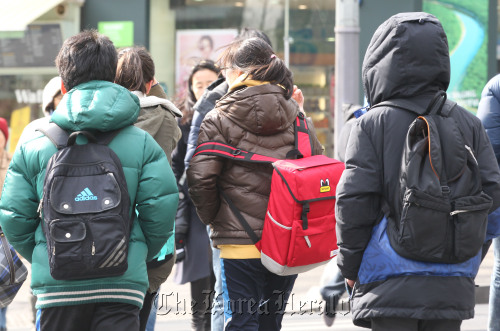 Students head to private academies or hagwon in Daechi-dong in southern Seoul, well known for its education fever and clusters of hagwon.  Yonhap News