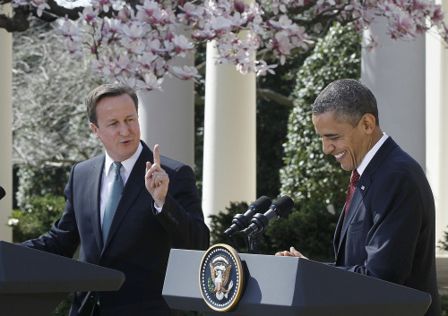 <YONHAP PHOTO-0202> President Barack Obama laughs as British Prime Minister David Cameron makes opening remarks during their joint news conference in the Rose Garden of the White House in Washington, Wednesday, March 14, 2012. (AP Photo/Charles Dharapak)/2012-03-15 07:26:54/ <저작권자 ⓒ 1980-2012 ㈜연합뉴스. 무단 전재 재배포 금지.>
President Barack Obama laughs as British Prime Minister David Cameron makes opening remarks during their joint news conference in the Rose Garden of the White House in Washington on Wednesday.  AP-Yonhap News