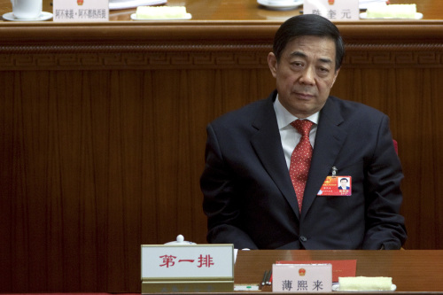 Bo Xilai, then Chinese Communist Party secretary of Chongqing, attends the closing ceremony of China's National People's Congress at the Great Hall of the People in Beijing, China, on Wednesday. China ousted Bo as Communist Party secretary of one the nation's biggest cities in the strongest rebuke of a Politburo member in at least five years as Premier Wen Jiabao seeks to end a political scandal before a leadership change due later this year. (Bloomberg)