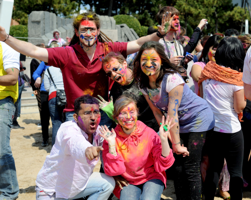 Expats join in the Holi celebrations at Haeundae Beach in Busan.  Sampa Guhamajumdar