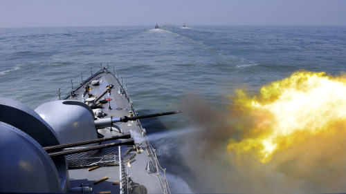 The patrol combat corvette Yeongju fires 40 mm (front) and 76 mm guns during an exercise held ahead of the two-year anniversary of the sinking of the ship Cheonan by North Korea on March 26, 2010. (Joint Press Corps)