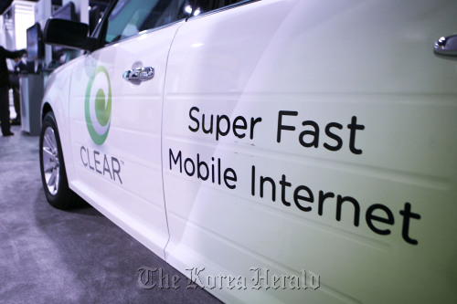 Signage for mobile internet provided by Clearwire Corp. sits on display at an electronics show. Bloomberg
Signage for mobile internet provided by Clearwire Corp. sits on display at an electronics show.  Bloomberg